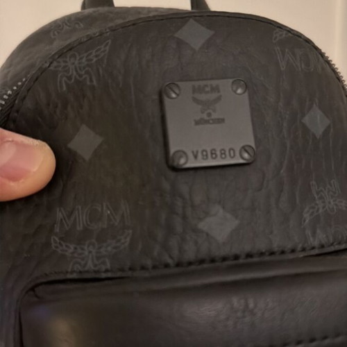 Mcm mini backpack like new, black shoulder bag
