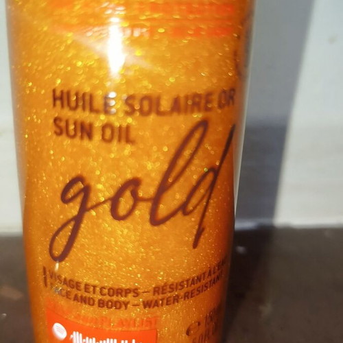 Nuxe Sun Oil Gold SPF 50 new, iridescent sunscreen oil