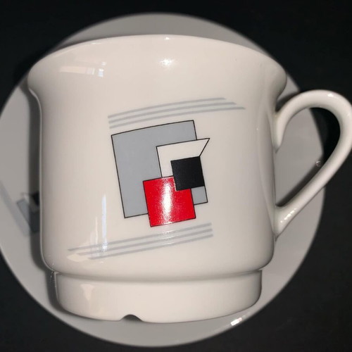 Ionia porcelain cup used with two saucers
