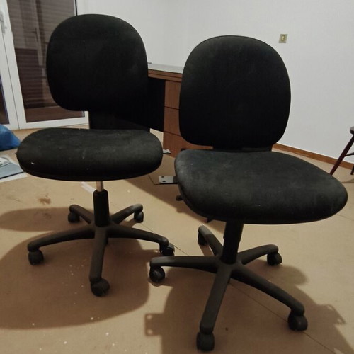 Office desk set used with three drawers and two chairs with wheels