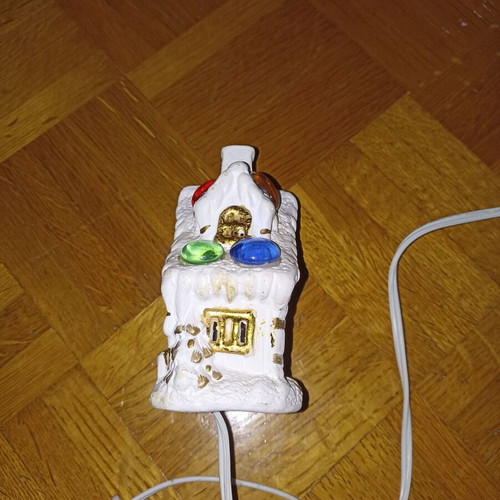 Small white church-shaped lamp with multicolor lights like new