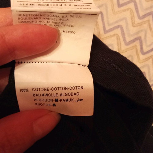 Benetton top size small black like new with lace
