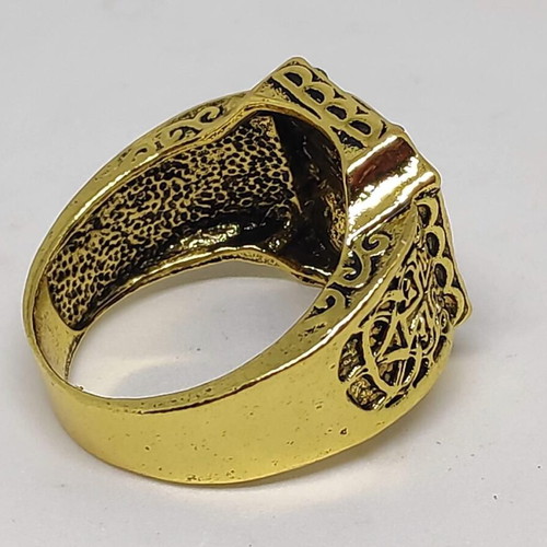 Byzantine men's ring with embossed saint and purple stones like new