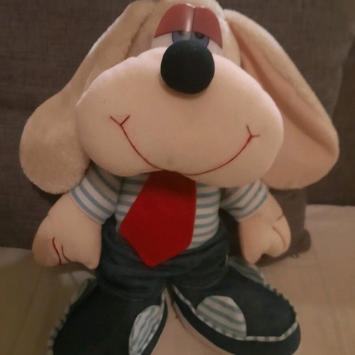 Vintage plush dog used with retro style and clothes
