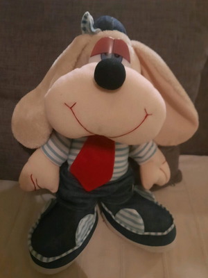 Vintage plush dog used with retro style and clothes