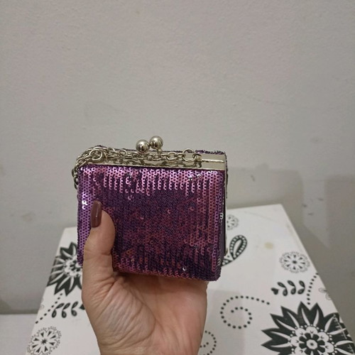 Clutch bag polygonal like new with purple sequins