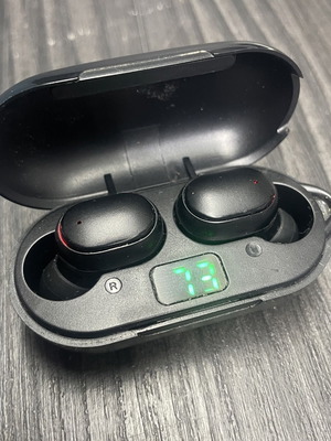Wireless earbuds black with charging case used