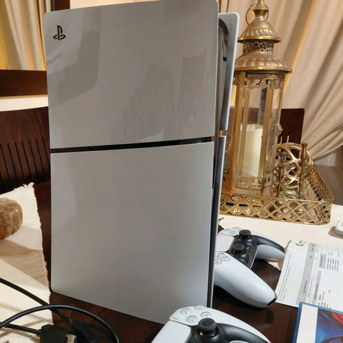 PlayStation 5 Slim Disc Edition with 2 DualSense controllers and Gran Turismo 7 like new