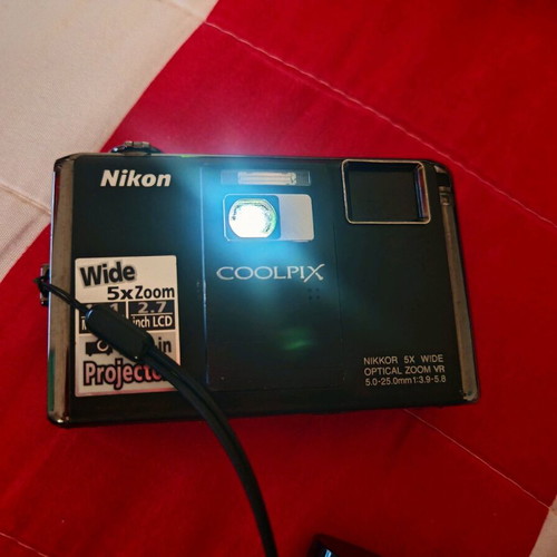 Nikon Coolpix S1000pj digital camera 12MP used with built-in projector
