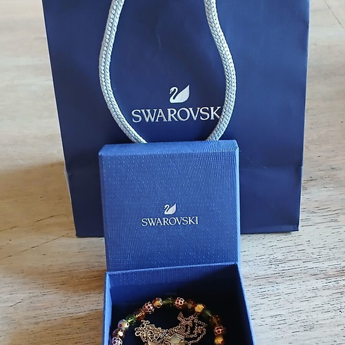 Swarovski necklace and bracelet set like new, gold color