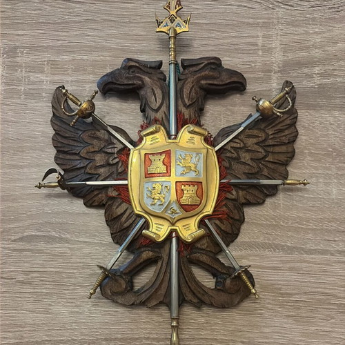 Vintage decorative Toledo wall coat of arms with swords used