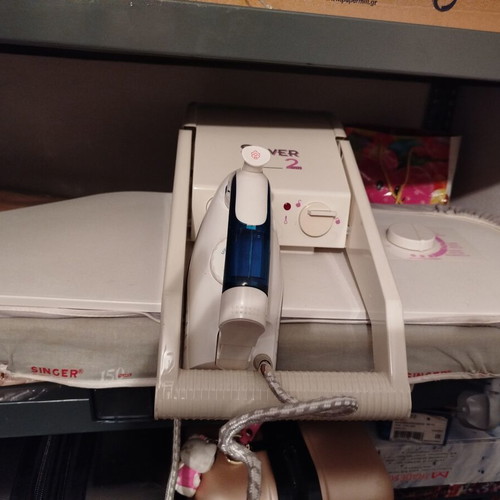 Singer Silver 2 Plus ironing board used with suction and heating