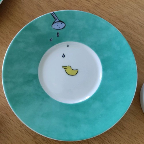 Set of 2 coffee cups with saucers like new, turquoise with hippopotamus