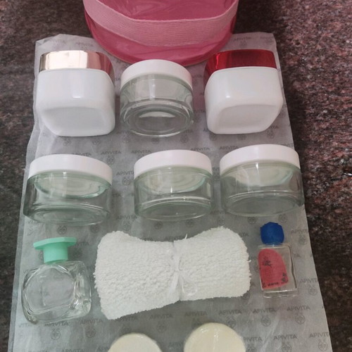 Cosmetic storage set like new with empty jars and pink pouch