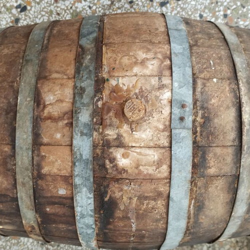Old oak barrel used with cork stopper and plastic spigot