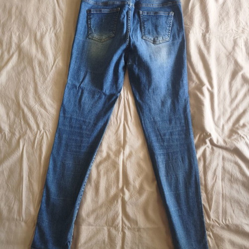 Elastic slim fit blue jeans, size large