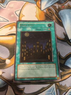Dark City Yu-Gi-Oh card used, Ultimate Rare, damaged