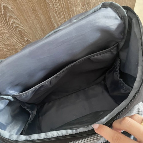 Baby bag with thermos holder and changing mat used