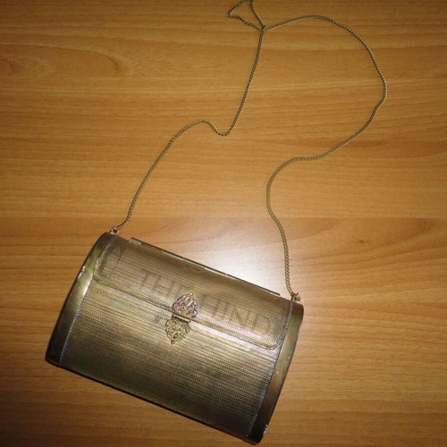 The Hind antique bag used, early 20th century, brass with plush interior