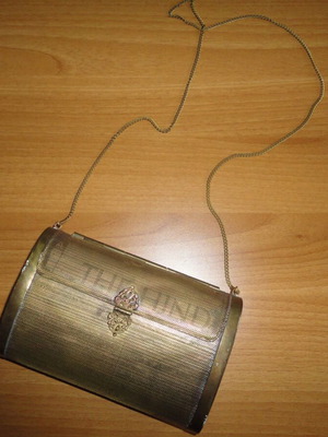 The Hind antique bag used, early 20th century, brass with plush interior