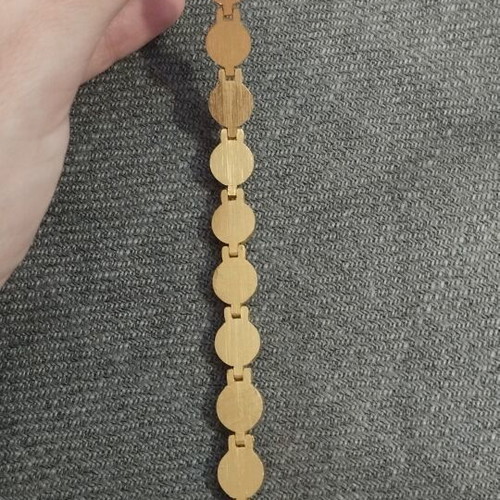 Vintage women's bracelet with red/brown cabochon beads on gold base, like new