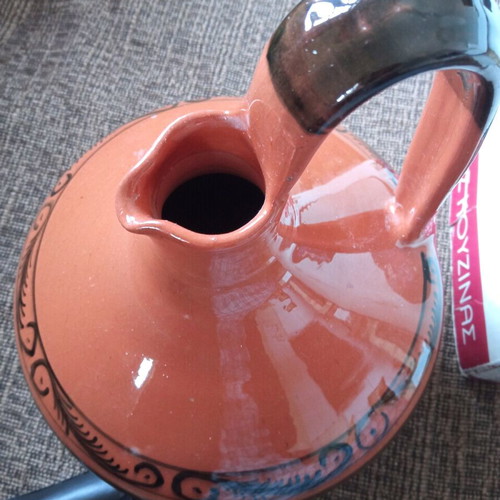 Ceramic wine jug like new with painted border
