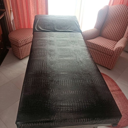 Massage bed like new with leatherette upholstery
