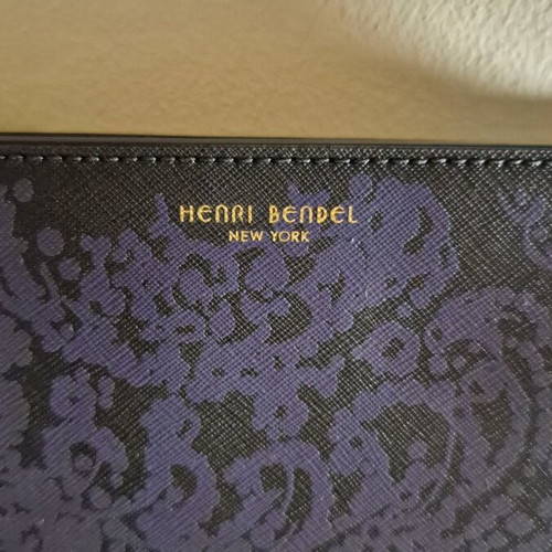 Henri Bendel luxury clutch new, leather with floral design
