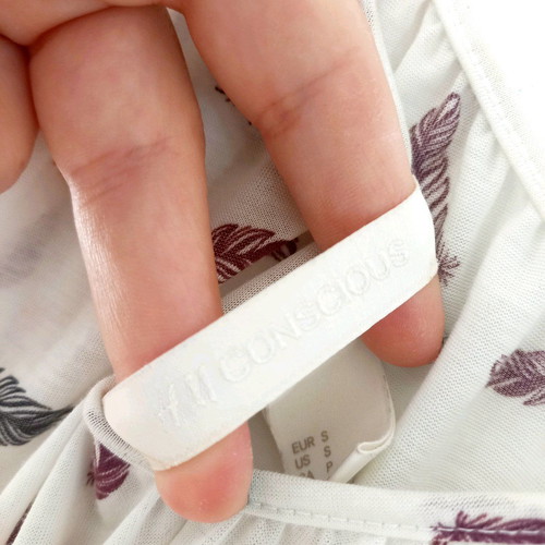 H&M strap top like new, white with feather print