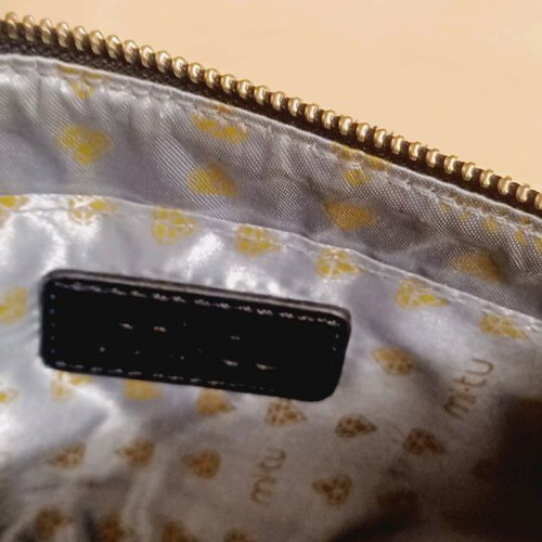 Mi Tu black hand bag new with gold details
