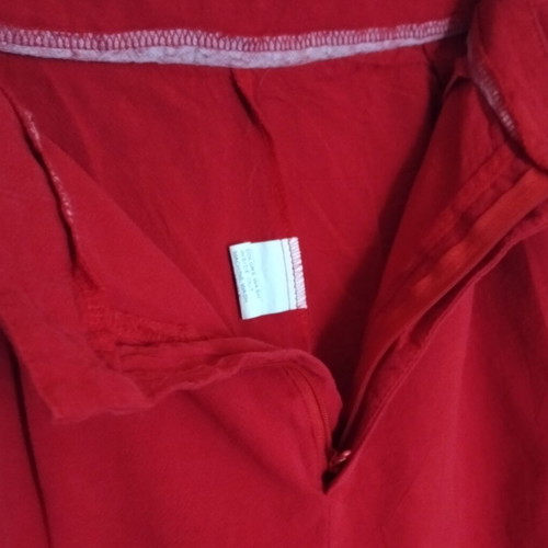 High-waisted women's red shorts like new with ruffles and pleats