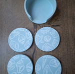 Handmade plaster coaster set with summer decoration and soft blue color