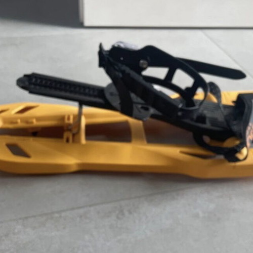 Sneka snowshoes used for hiking with metal crampons