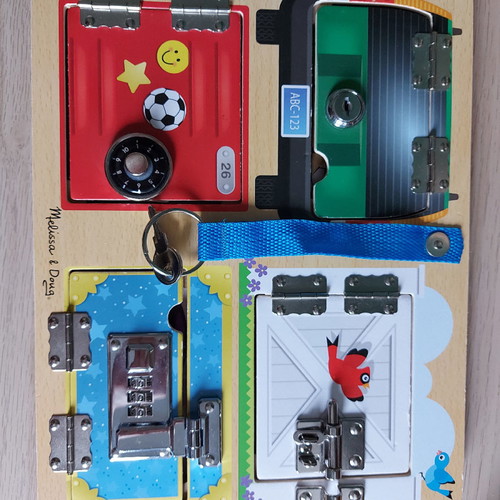 Melissa & Doug wooden board with locks used