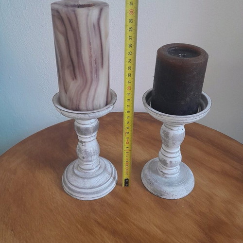 Wooden candlesticks with candles used, set of 2 pieces
