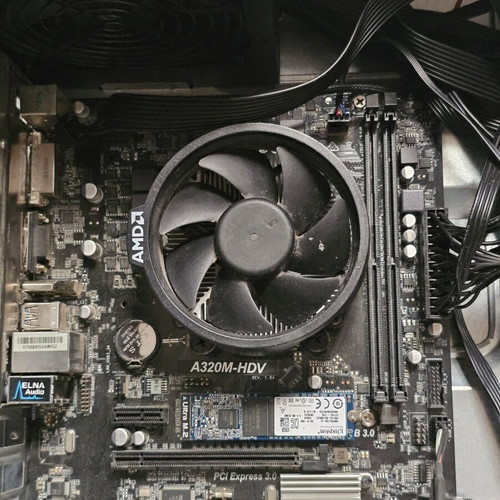 Motherboard Asrock A320-HDV with Ryzen 2200g processor, fan and 128GB disk used