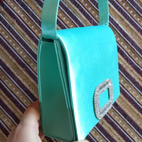 Satin bag unused with strap and chain turquoise