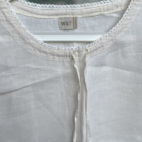 Cream linen blouse with cord and decorative edges