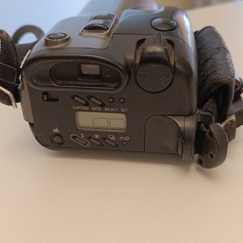 Canon camera used, not working but repairable with accessories