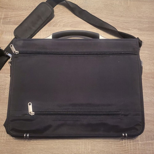 Delsey briefcase like new, black with multiple compartments