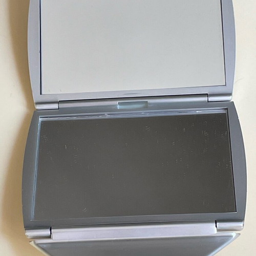 Folding Bag Mirror like new with magnifying side