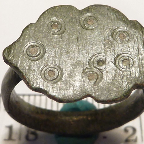 Old Revival bronze ring with decoration used