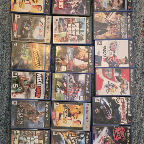 Ps2 games pack with 18 used games in their cases