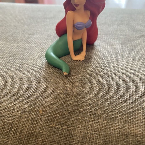 Ariel figure used, missing tail
