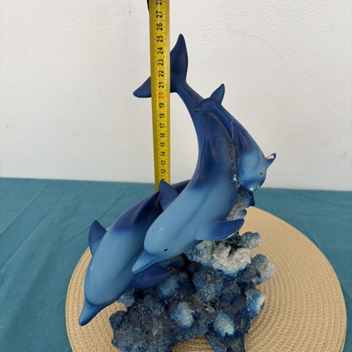 Decorative dolphins refurbished with damage