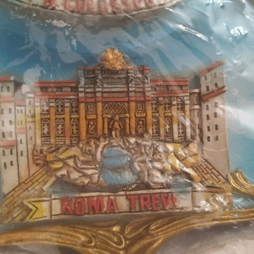 Decorative souvenir plate from Rome with embossed landmarks, new