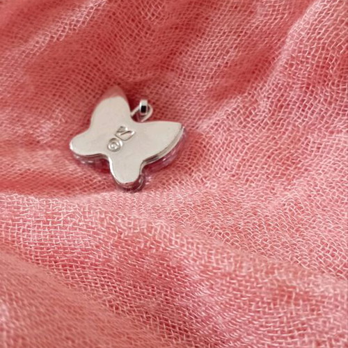 Swarovski butterfly pendant like new, lilac color