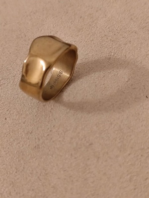Two rings with beautiful design made of gold stainless steel, new