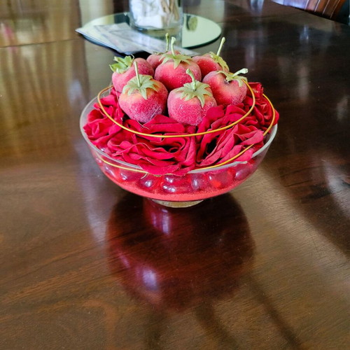 Decorative glass bowl centerpiece with red roses and velvet fruits like new