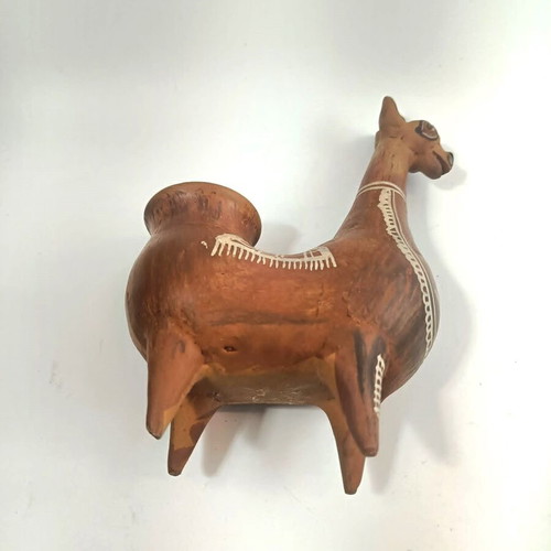 Handmade traditional Peruvian ceramic vessel in llama shape, like new